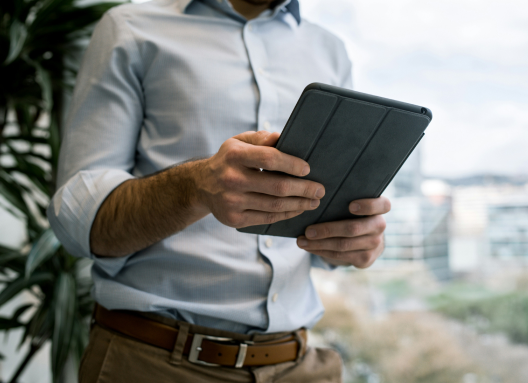 Man holding tablet